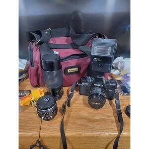Minolta X-700 MPS Film Camera with 3 Lenses, and Manuals